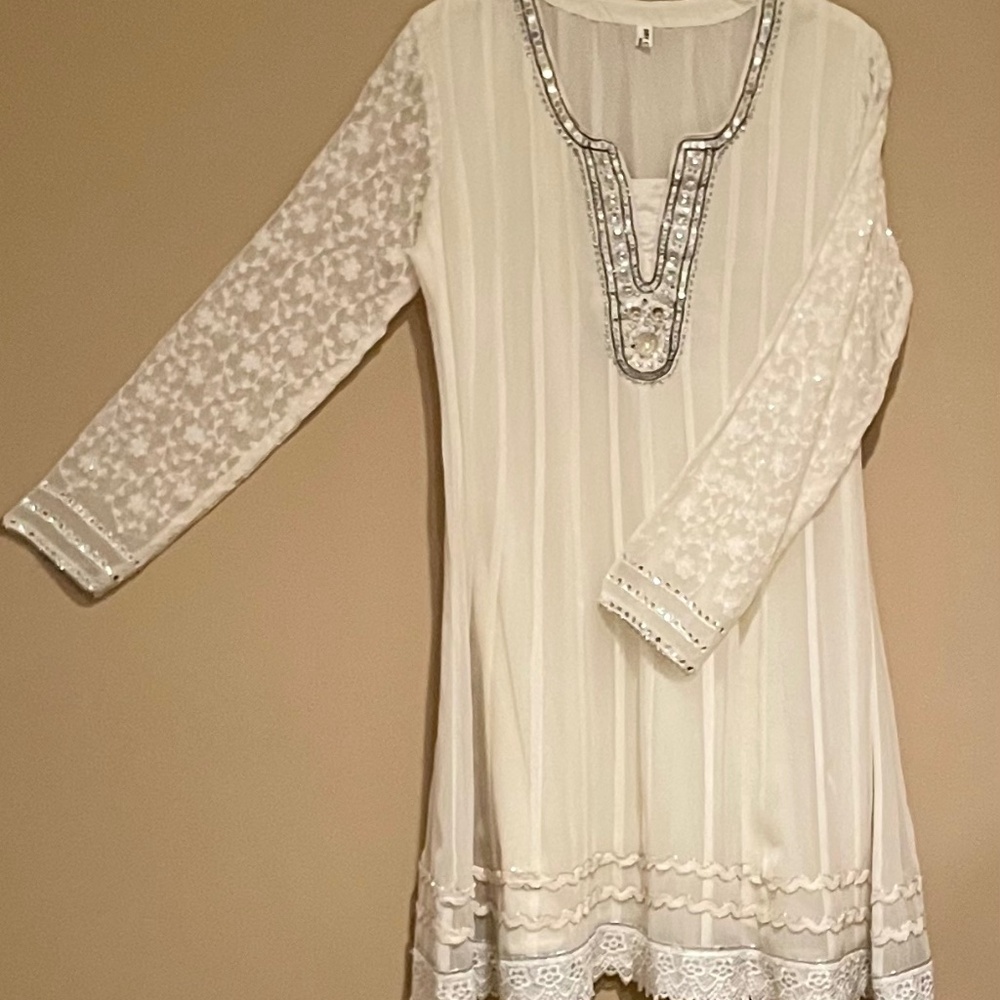 Handmade beaded and lined dress, made in India.